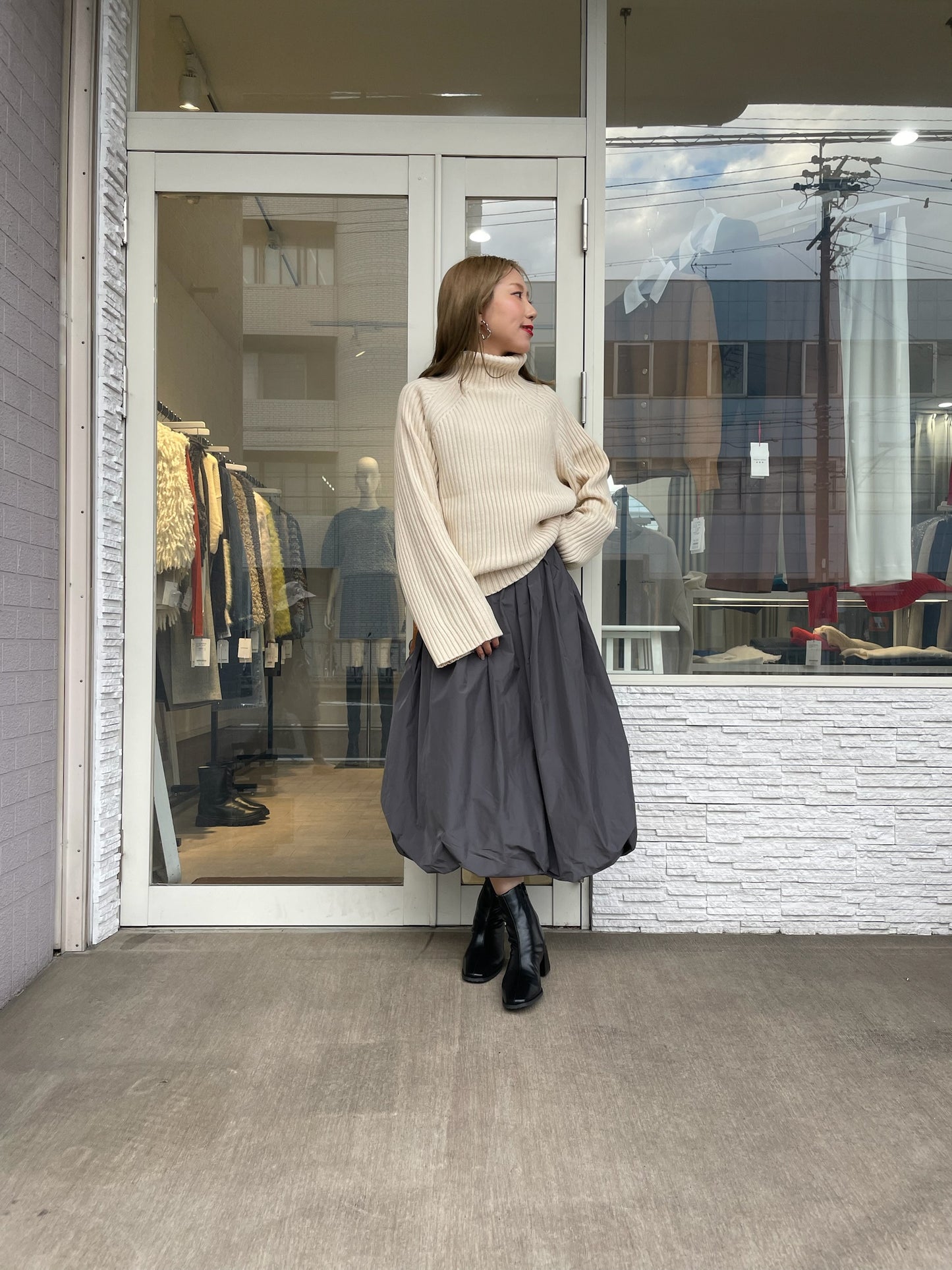 オフタートルリブニット