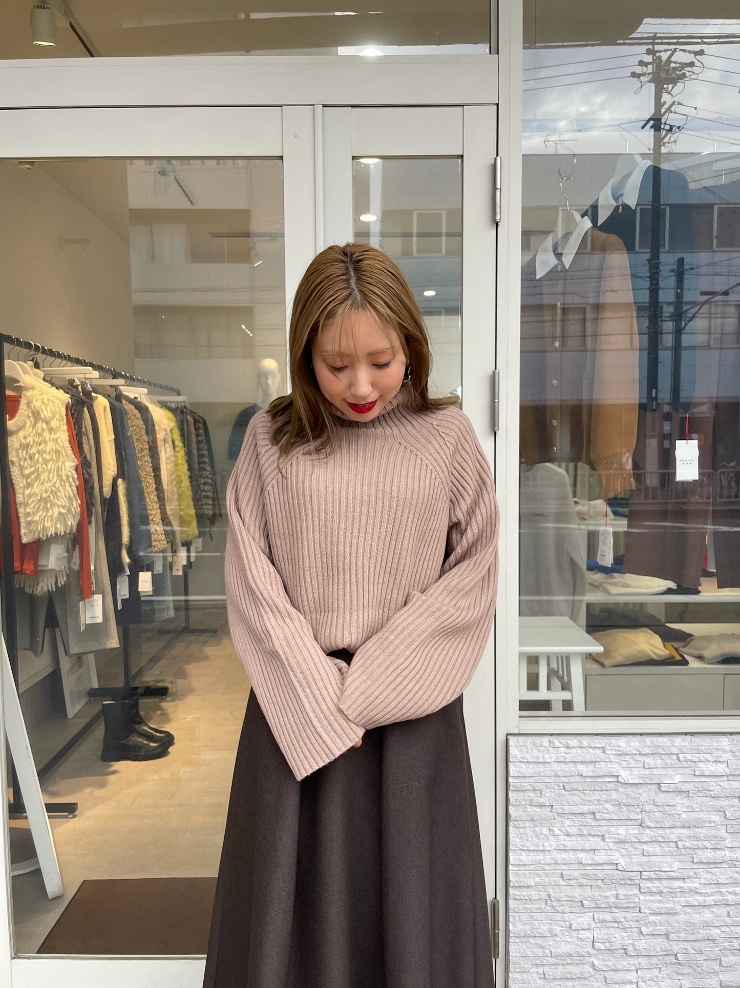 オフタートルリブニット