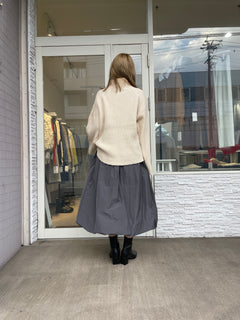 オフタートルリブニット